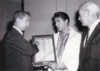 14. On the set of Harum Scarum, Elvis received the No. 1 in the Nation award for his Roustabout album.